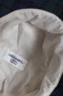 Câbleami – Organic Cotton Cordura Hat With Drawcord – Black Watch 9 Câbleami – Organic Cotton Cordura Hat With Drawcord – Black Watch -Salomon Boutique rdv cableami 06 scaled 2